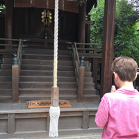 Praying at Shinto shrine